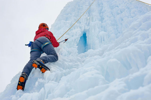 Men doing ice climbing in Tirol