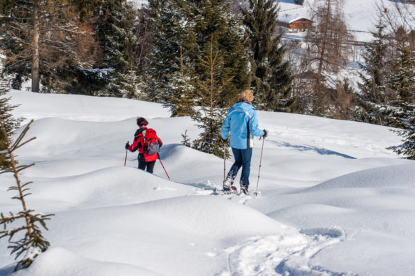 two women snowshoeing in Tirol